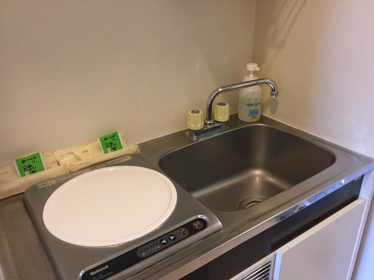 Business Inn Grandeur Fuchu Rom bilde
